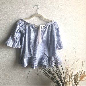 Off shoulder white and blue stripe peplum top